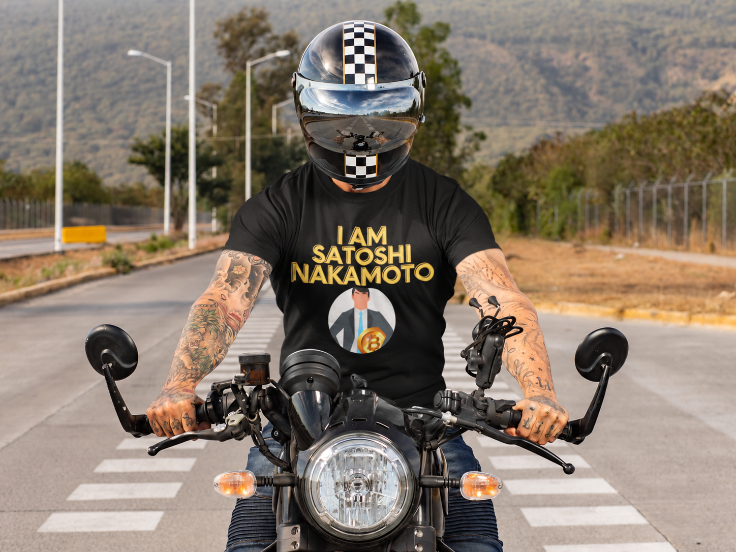 Motorcyclist wearing an I Am Satoshi Nakamoto T-shirt